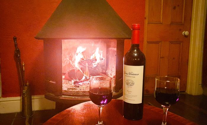 Cosy up by the fire in The Keeper's Cottage